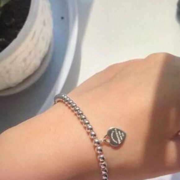 Tiffany & Co. Silver Bracelet with Blue Heart Charm - Picture 3 of 4